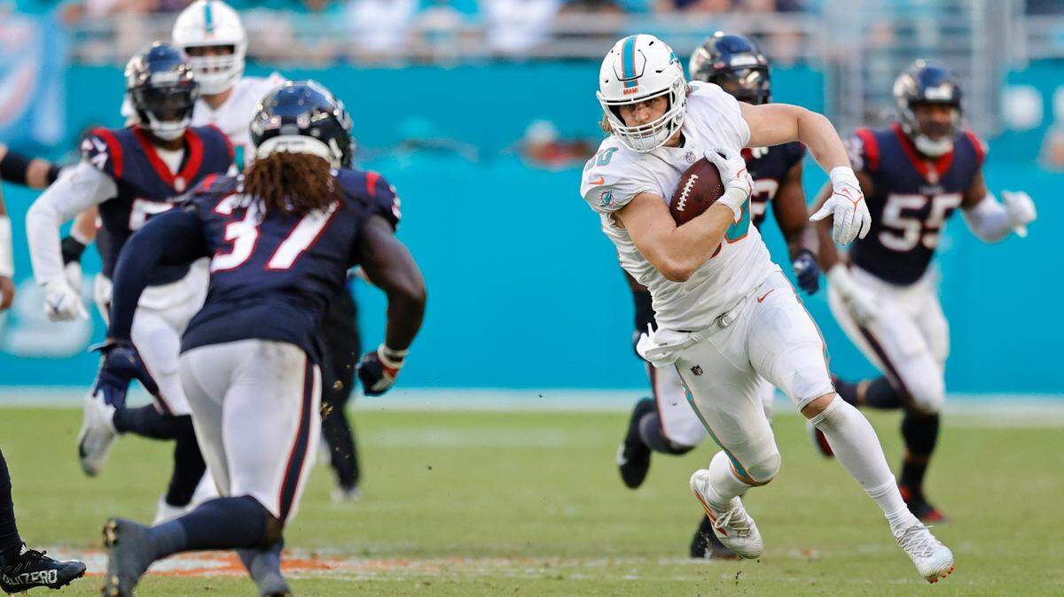 Miami Dolphins tight end Adam Shaheen (80) runs with the football during third quarter of an NFL football game against the Houston Texans at Hard Rock Stadium on Sunday, November 7, 2021 in Miami Gardens, Florida.