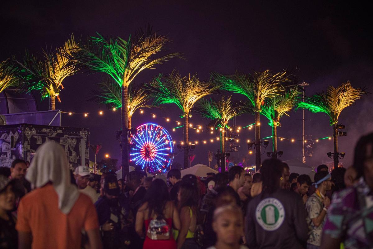 People are seen at Rolling Loud at Hard Rock Stadium in Miami Gardens, Florida on Sunday, July 24, 2022.