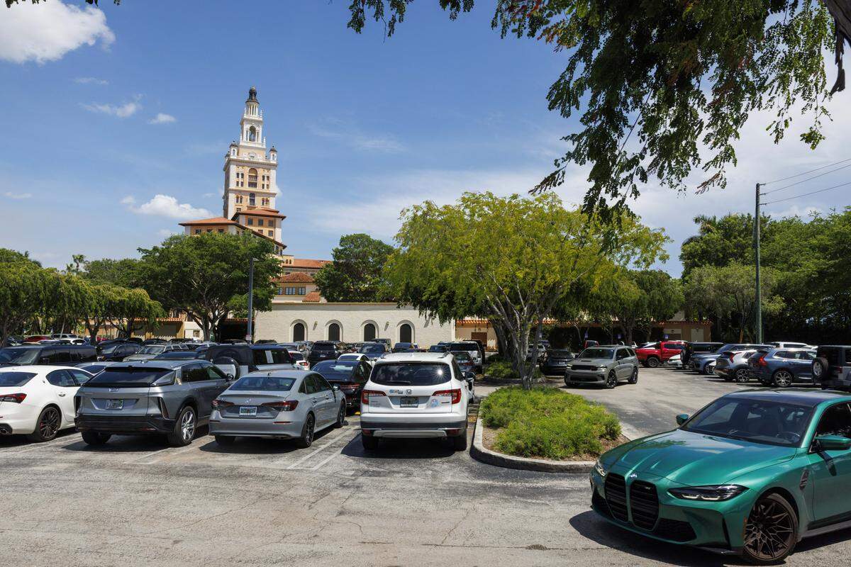 A car drives through the free parking lot outside the Biltmore Hotel during the day on Wednesday, Aug. 20, 2025, in Coral Gables, Fla. 