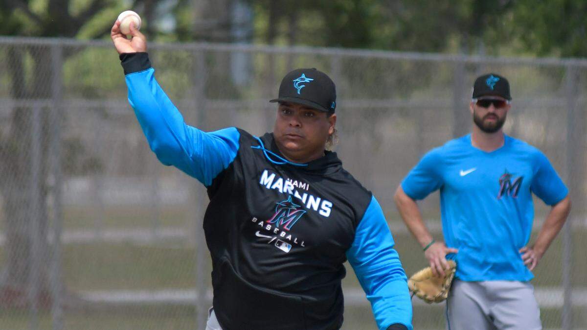Miami Marlins utility player Willians Astudillo runs a defensive drill during a spring training workout on Wednesday, March 30, 2022, at the Roger Dean Chevrolet Stadium complex in Jupiter, Florida.
