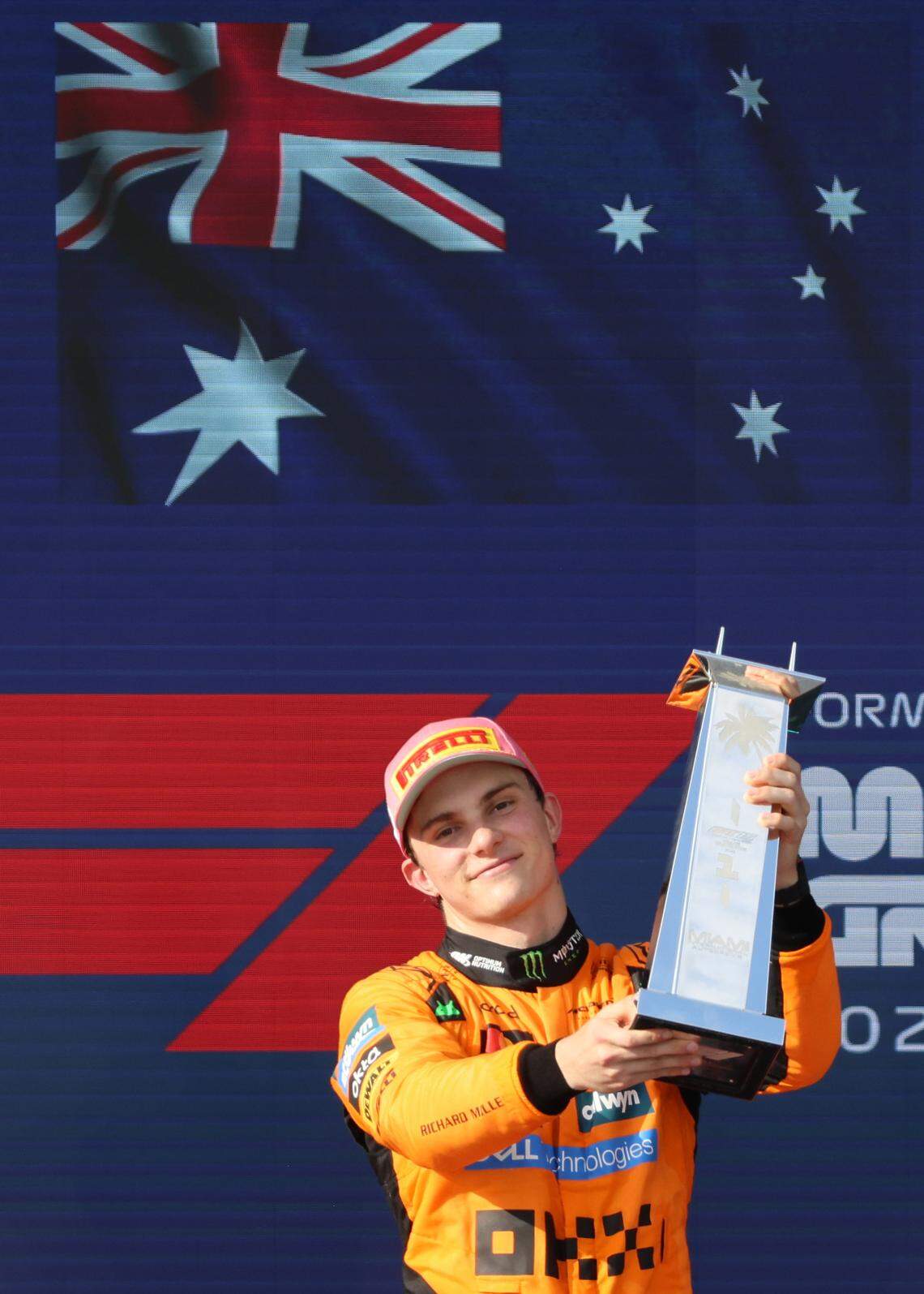 McLaren driver Oscar Piastri of Australia lifts his trophy after winning the Formula One Miami Grand Prix at the Miami International Autodrome on Sunday, May 4, 2025, in Miami Gardens, Fla.