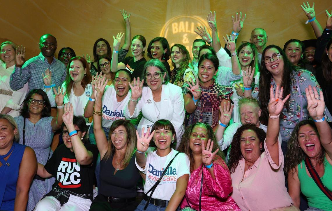 Mayor Daniella Levine Cava celebrates with supporters as they flash “four,” for four more years, during the Levine Cava watch party on election night at Ball and Chain in Little Havana on Tuesday, Aug. 20, 2024.