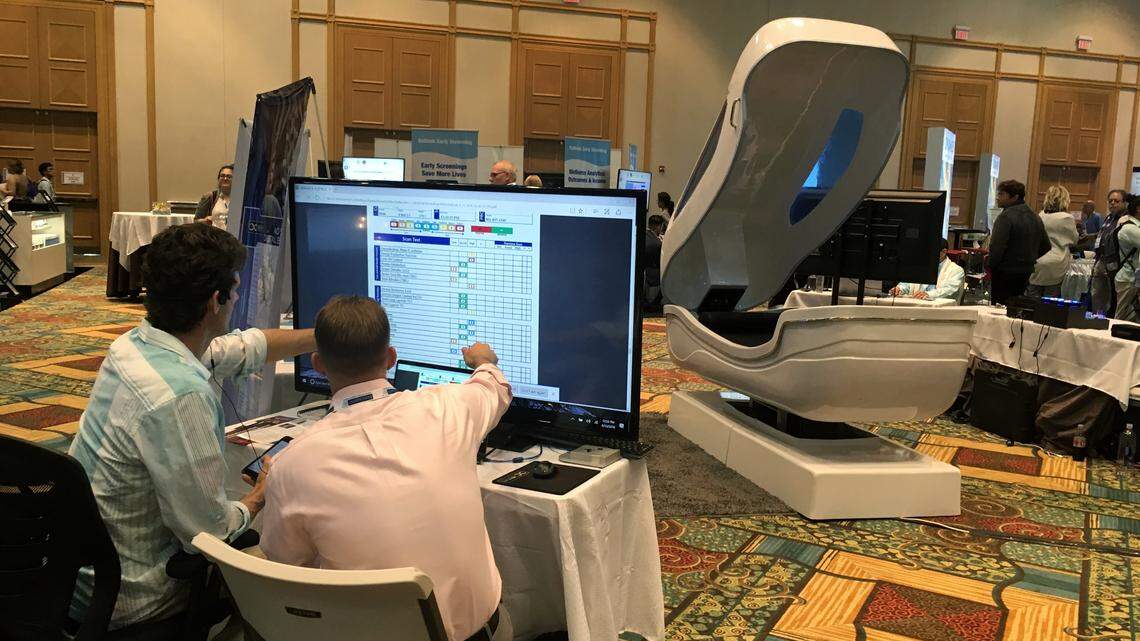 Technologies featured in the exhibition hall at Florida Anti-Aging conference included this mechanical hypnosis pod for treating mental health disorders.
