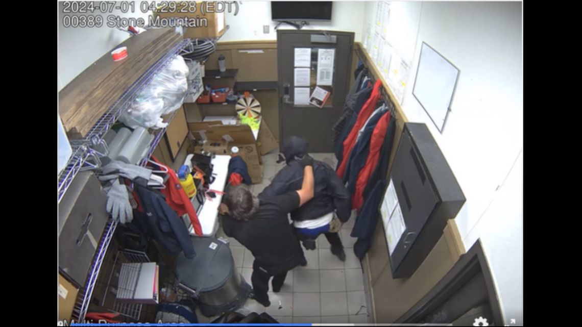 The video shows the victim grabbed the man’s hands and refused to let go as they struggled in the kitchen.