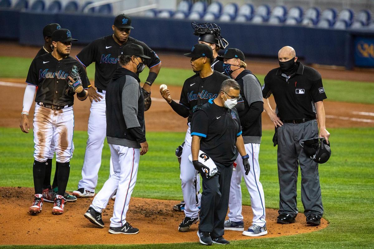 Miami Marlins right-handed pitcher Elieser Hernandez&nbsp;(57) is taken out by Marlins manager Don Mattingly during the third inning of an MLB game against the Tampa Bay Rays at loanDepot park in the Little Havana neighborhood of Miami, Florida, on Saturday, April 3, 2021.
