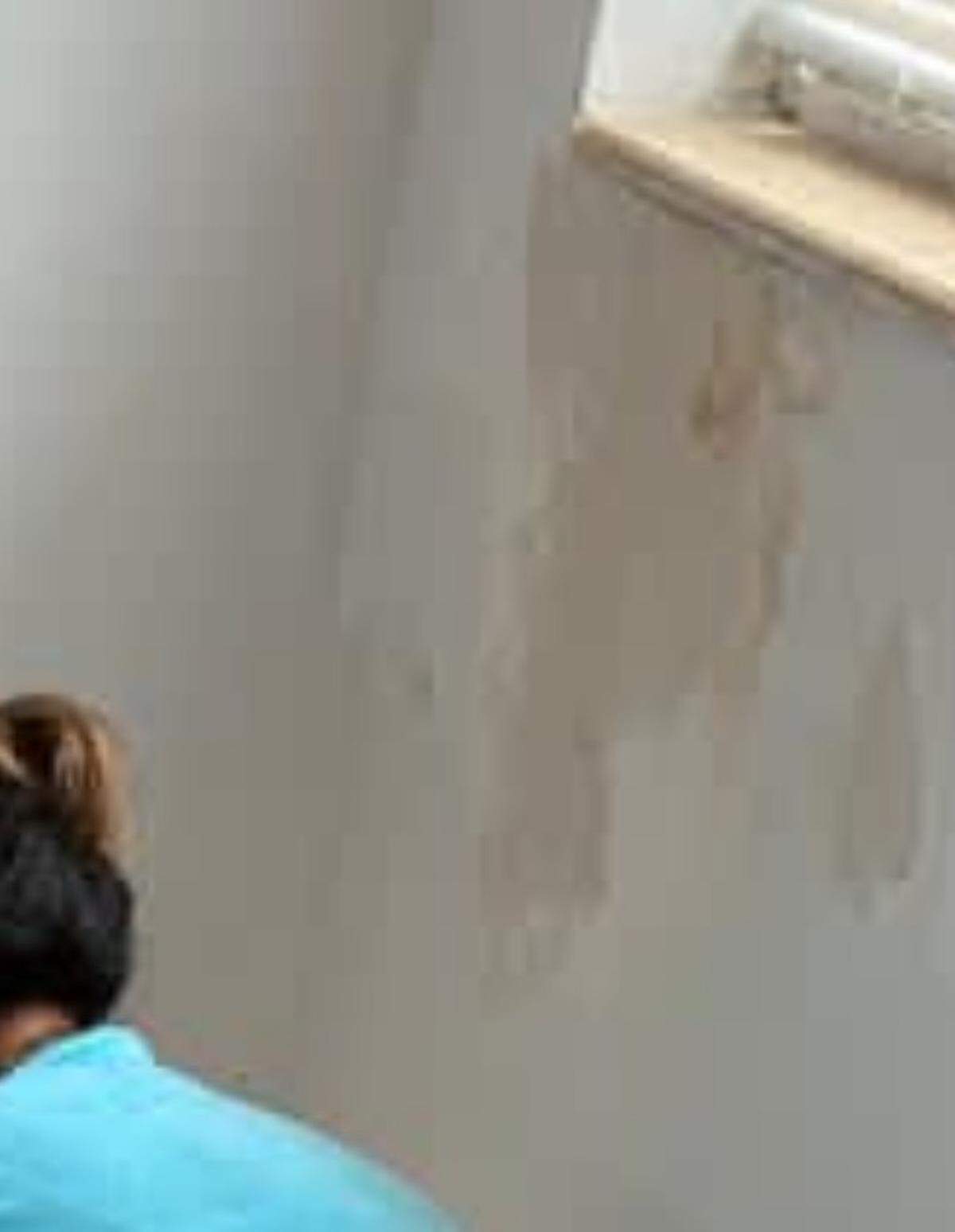 Water damage is seen below the window sill of a unit inside the Mariner Place apartment building in the Middle Florida Keys city of Marathon.