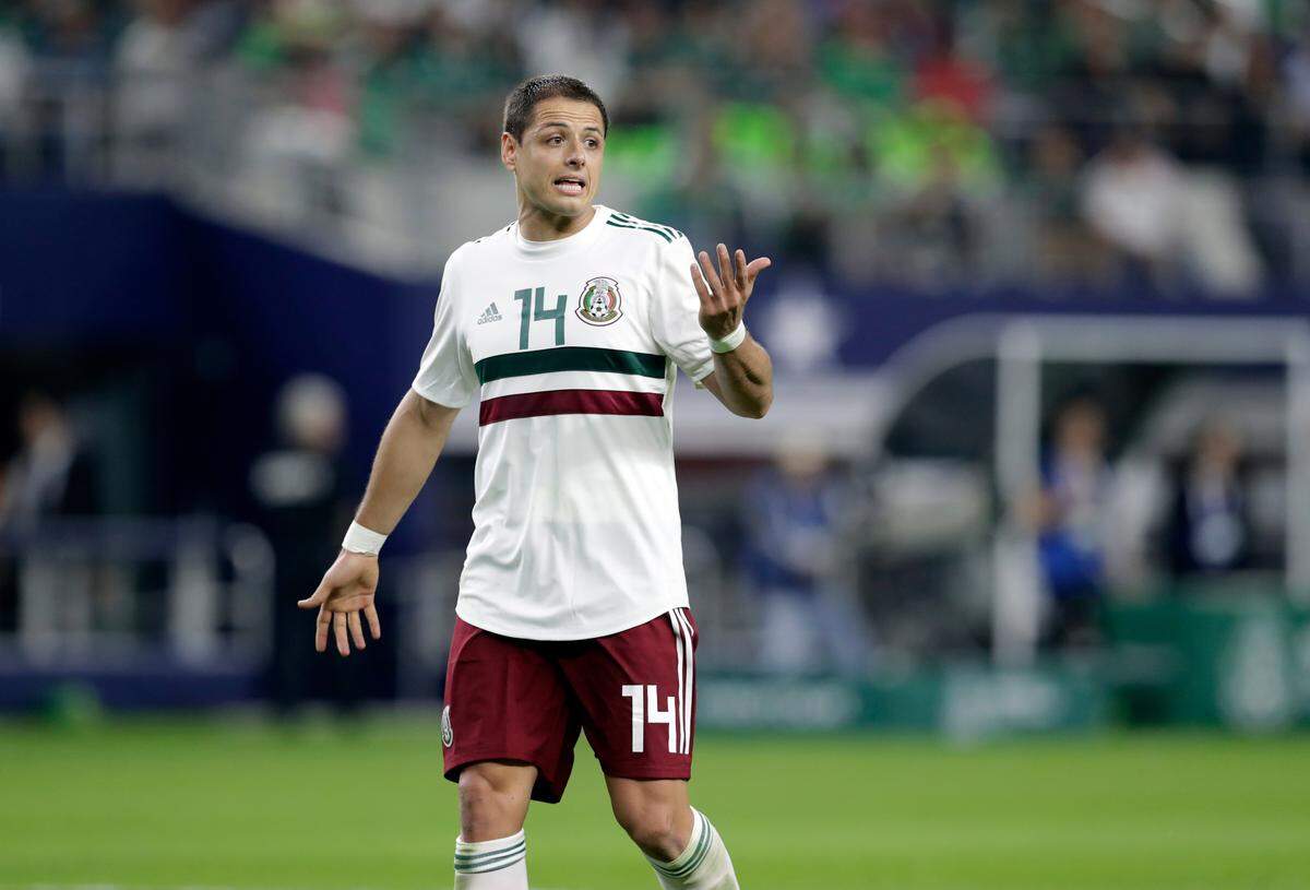 In this image taken on Tuesday, March 27, 2018 Mexico forward Javier Hernandez jogs across the field talking to an official, not pictured, during a international friendly soccer match against Croatia in Arlington, Texas, Tuesday, March 27, 2018. (AP Photo/Tony Gutierrez)