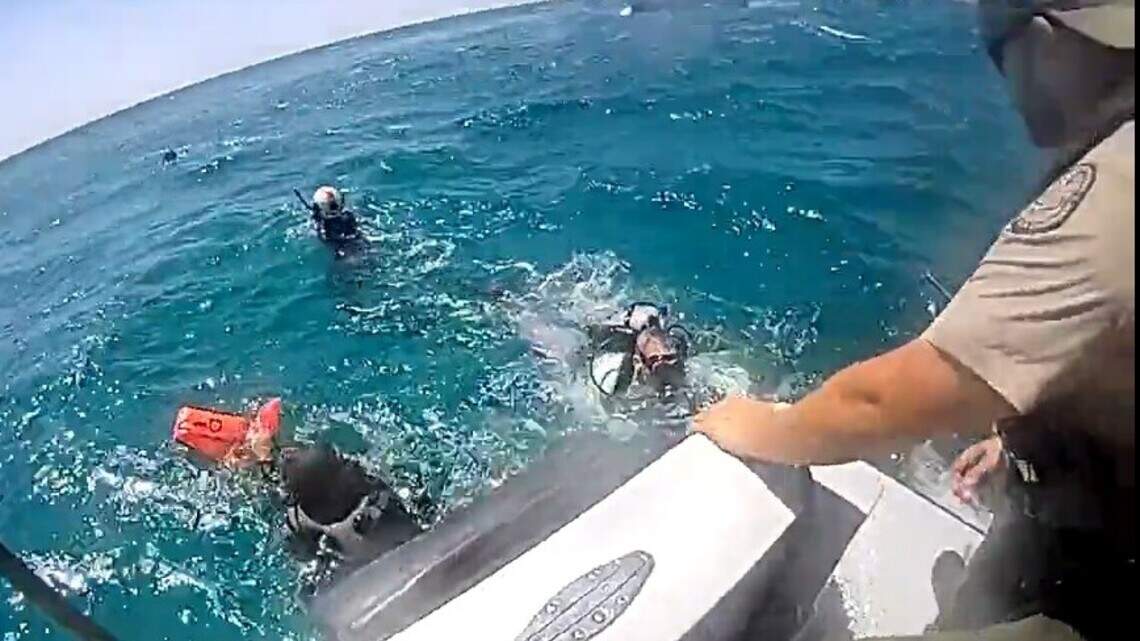 FWC officers, U.S. Navy air crew rescue three lobster divers in Florida Keys