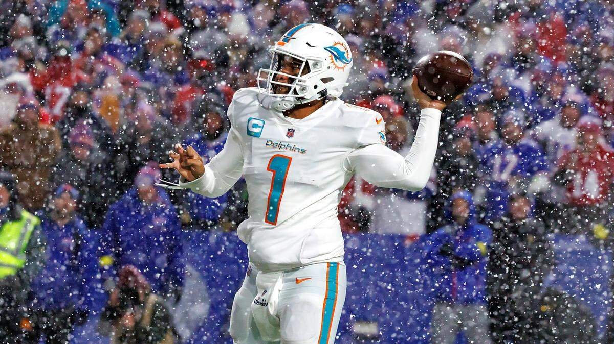 Miami Dolphins quarterback Tua Tagovailoa (1) sets up to pass during fourth quarter of an NFL football game against the Buffalo Bills at Highmark Stadium on Saturday, December 17, 2022 in Orchard Park, New York.