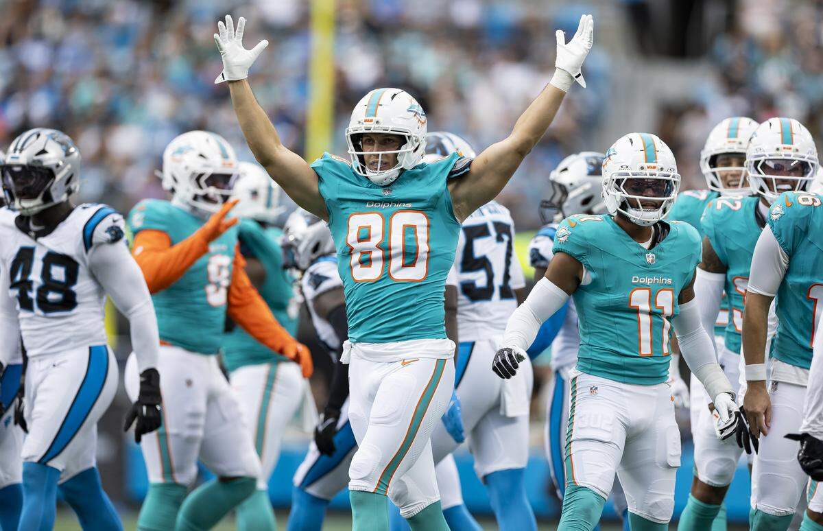 Miami Dolphins tight end Tanner Conner (80) reacts after a play against the Carolina Panthers in the first half of their NFL game at the Bank of America Stadium on Sunday, Oct. 5, 2025, in Charlotte, N.C.