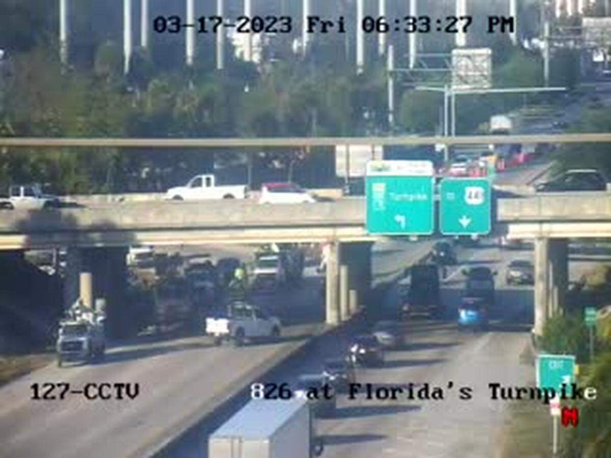 A truck hauling machinery that collided into an overpass closed part of the Palmetto Expressway on March 17, 2023.