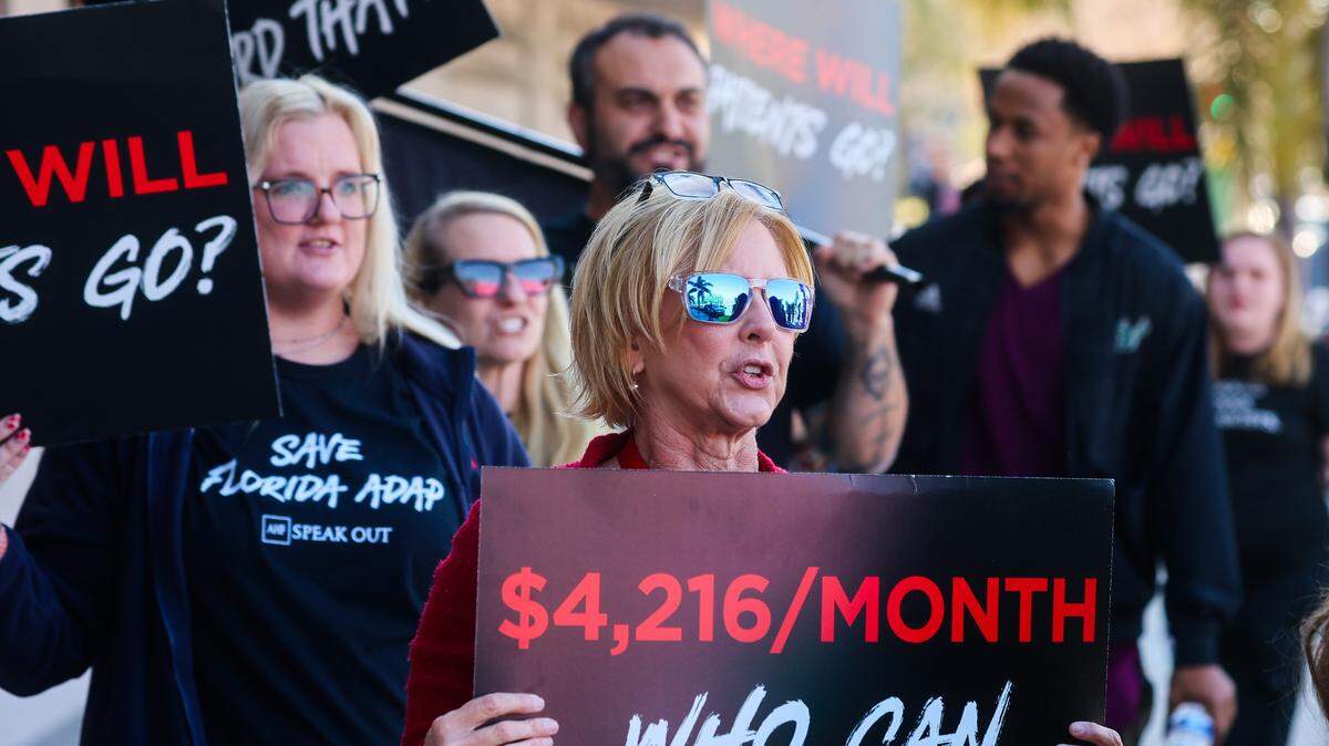 Amy Pinter the regional director of AHF Healthcare Center, chants along with about 30 fellow supporters with AHF outside of the Pinellas County Florida Department of Health office on Friday, Jan. 30, 2026 in St. Petersburg. The AIDS Healthcare Foundation held protests at the county health department in Pinellas and in Orange County demanding that the state undo their cuts to the AIDS Drug Assistance Program. AHF is suing the state to try and stop the cuts. 