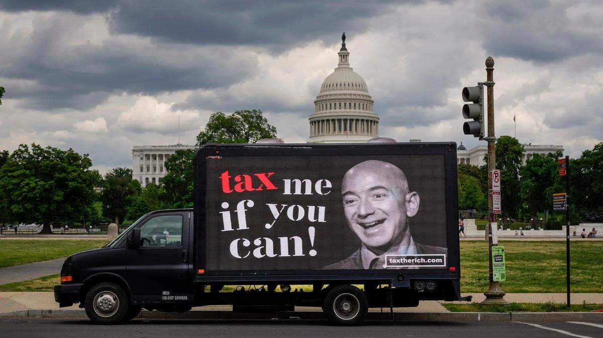 On May 17, Tax Day in 2021, a mobile billboard calling for higher taxes on the ultra-wealthy parked near the U.S. Capitol.