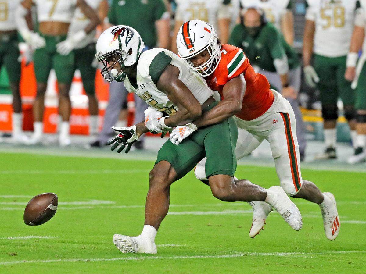UM’s cornerback Al Blades, Jr. (7) defends UAB’s Austin Watkins Jr. (6) as the University of Miami hosts the UAB Blazers at Hard Rock Stadium in Miami Gardens on Thursday, September 10, 2020.