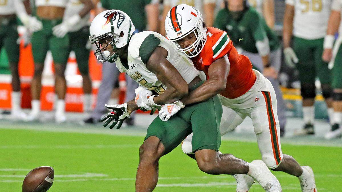 UM’s cornerback Al Blades, Jr. (7) defends UAB’s Austin Watkins Jr. (6) as the University of Miami hosts the UAB Blazers at Hard Rock Stadium in Miami Gardens on Thursday, September 10, 2020.