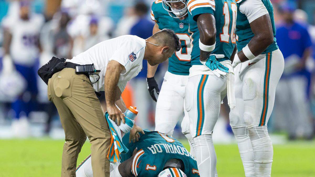 Miami Dolphins quarterback Tua Tagovailoa (1) suffers a concussion after a play against the Buffalo Bills in the second half of their NFL game at Hard Rock Stadium on Thursday, Sept. 12, 2024, in Miami Gardens, Fla.