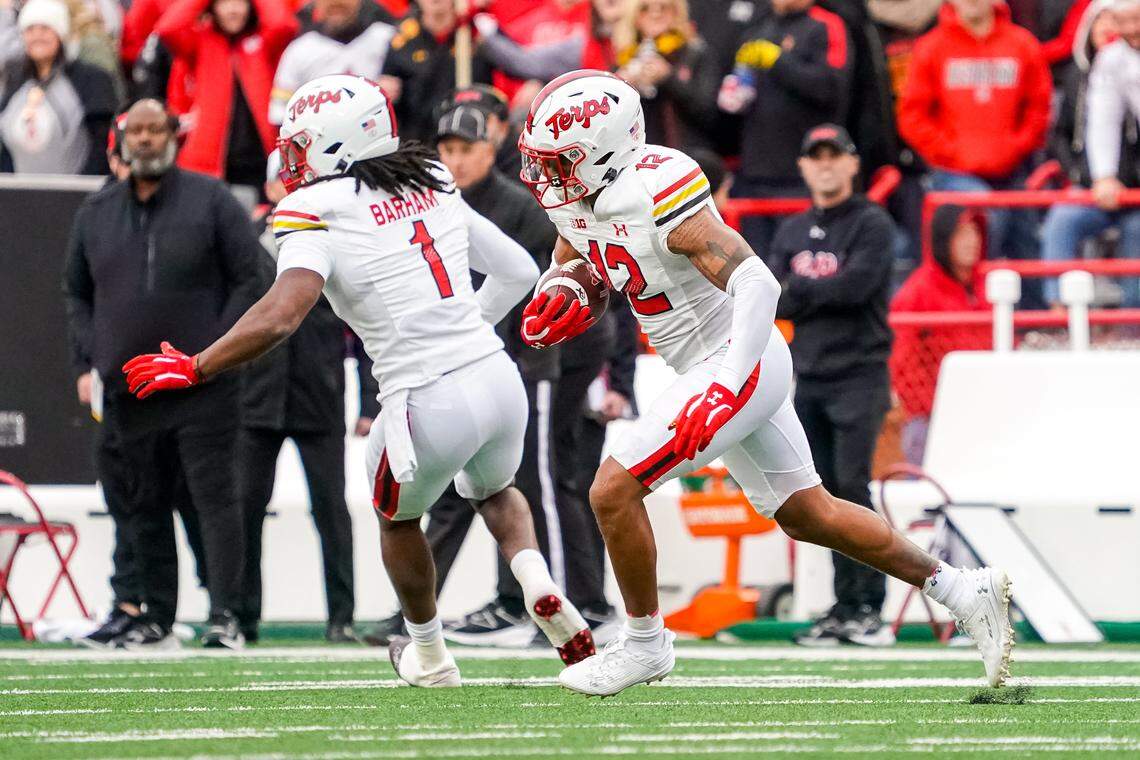 Nov 11, 2023; Lincoln, Nebraska, USA; Maryland Terrapins defensive back Dante Trader Jr. (12) runs after getting an interception against the Nebraska Cornhuskers during the first quarter at Memorial Stadium.