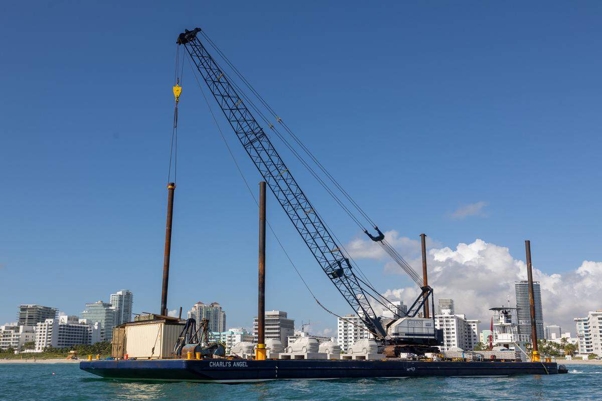 The first phase of the REEFLINE snorkleing sculpture park project will submerge 22 concrete cars underwater. Today one car was put in the water.