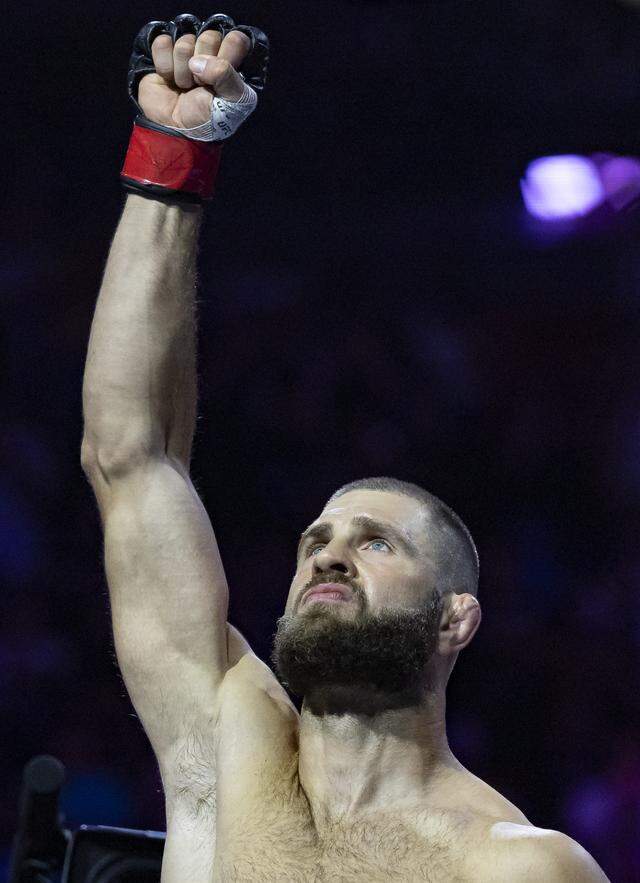 Jiří Procházka of Czechia reacts as he makes his way into the octagon before his light heavyweight title bout against Carlos Ulberg of New Zealand at UFC 327 at the Kaseya Center on Saturday, April 11, 2026, in downtown Miami, Fla.