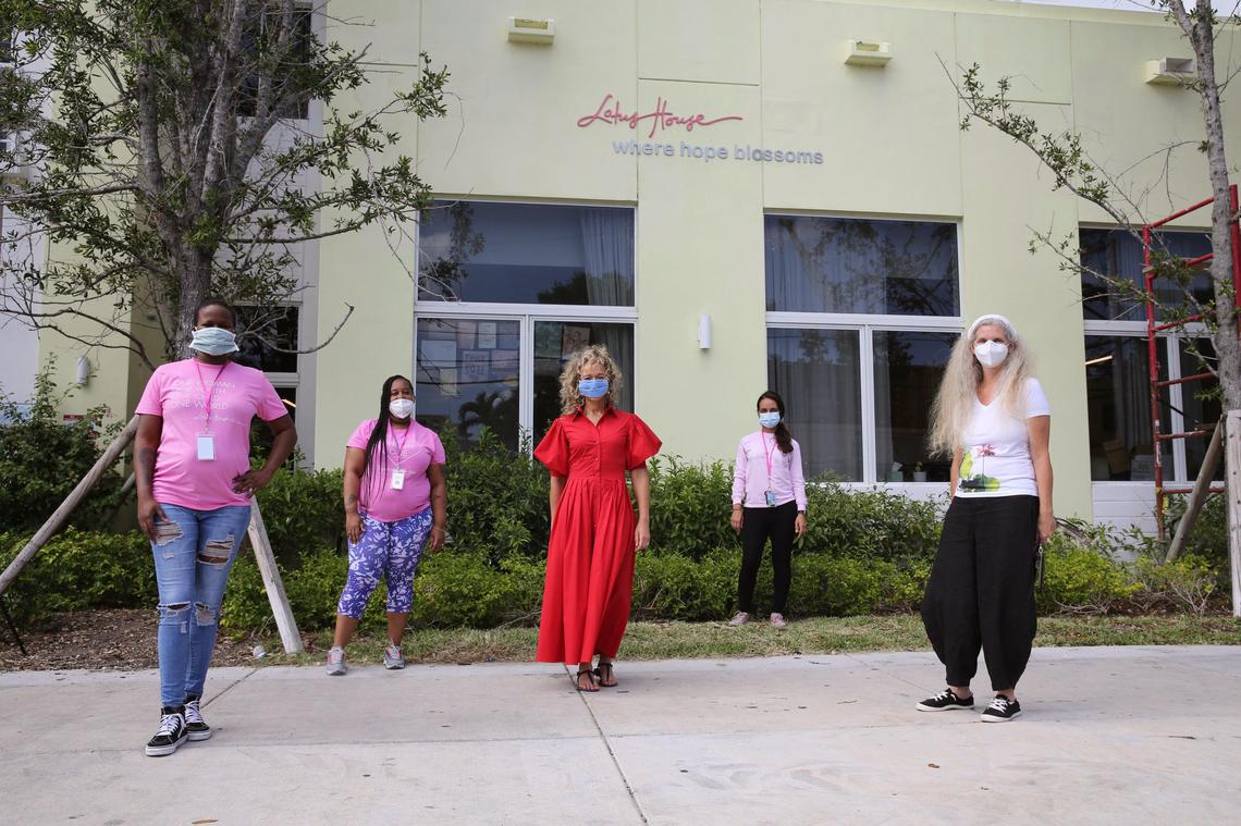 From L-R, Georgette Madison, Assistant Director of Purchasing at Lotus House, Marissa Phillips, Operations Manager, Jacqueline Nickelberry, a local philanthropist, Beatrice A. Gonzalez, Community Outreach Director and Constance Collins, President and Executive Director, pose for a photo while practicing social distancing in front of the Lotus House Wednesday, April 29, 2020.