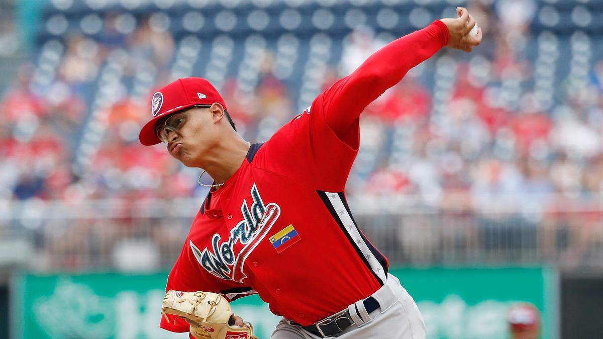 WASHINGTON, DC - JULY 15:  Starting pitcher Jesus Luzardo #9 of the Oakland Athletics and the World Team works the first inning against the U.S. Team  during the SiriusXM All-Star Futures Game at Nationals Park on July 15, 2018 in Washington, DC.  (Photo by Patrick McDermott/Getty Images)