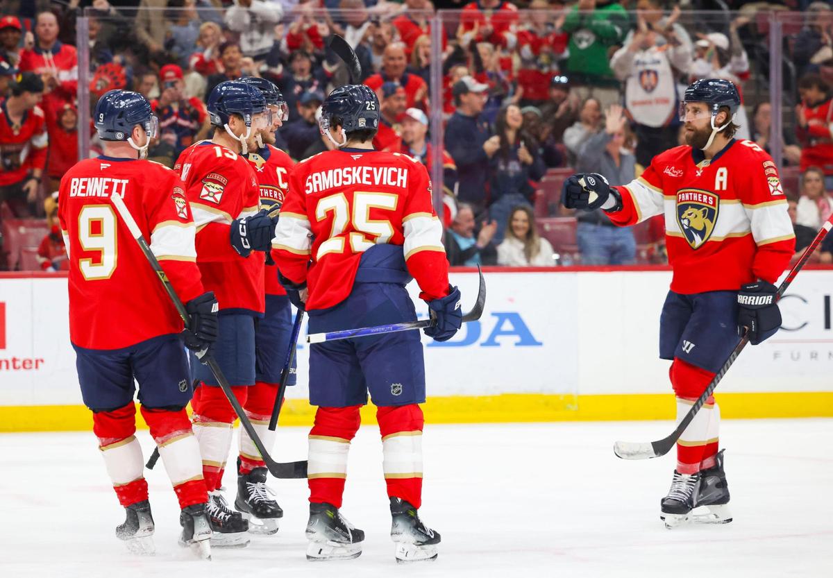 Florida Panthers center Sam Reinhart (13) celebrates his goal with teammates during the first period of a game against the Columbus Blue Jackets on Thursday, March 6, 2025, at Amerant Bank Arena in Sunrise, Fla.