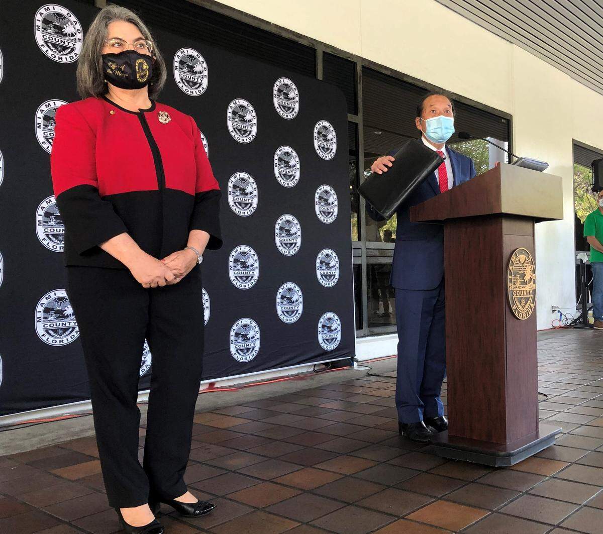 Miami-Dade Mayor Daniella Levine Cava, left, at a 2021 announcement with the county’s housing director Michael Liu. She reportedly has asked Liu to leave his post, and he’s planning to depart county government.