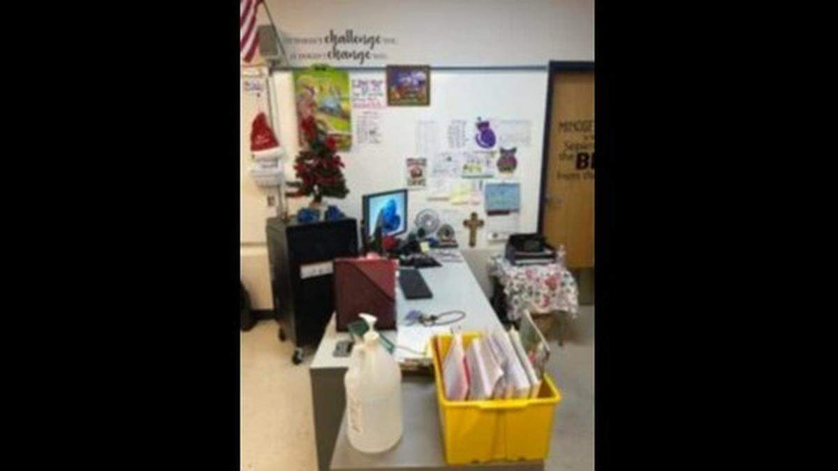 A crucifix, approximately 12-inches tall hangs on a wall adjacent to Castro’s desk, along with children’s art and a calendar. According to a lawsuit, Castro was asked to move the crucifix to a spot underneath her desk by school officials.