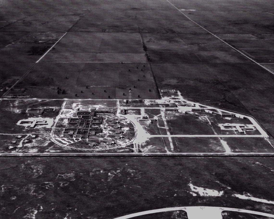A 1959 photo shows South Florida State Hospital under construction in Pembroke Pines. Aerial photo looks west with a two-lane Hollywood Boulevard in upper right corner. Runways of North Perry airport are at bottom of picture.