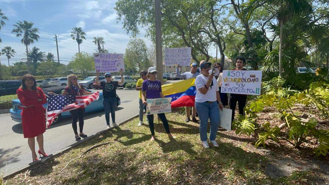 A small group of Venezuelan and other Latino Democrats protest outside U.S. Sen. Marco Rubio’s office in Southwest Miami-Dade, after he responded to critics in the Venezuelan community during a campaign stop, Wednesday, April 13, 2022.