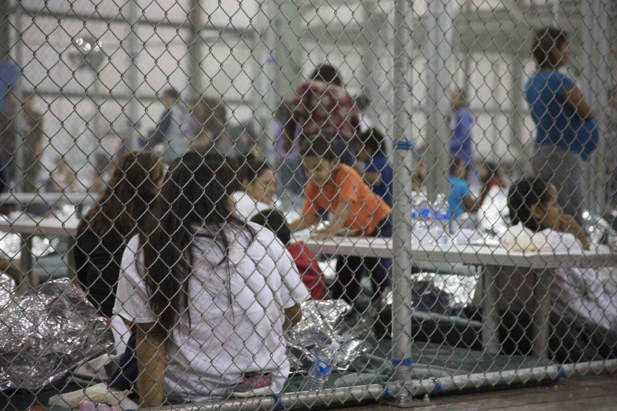 This U.S. Customs and Border Protection photo shows intake of immigrants by the U.S. Border Patrol agents at the Central Processing Center in McAllen, Texas.