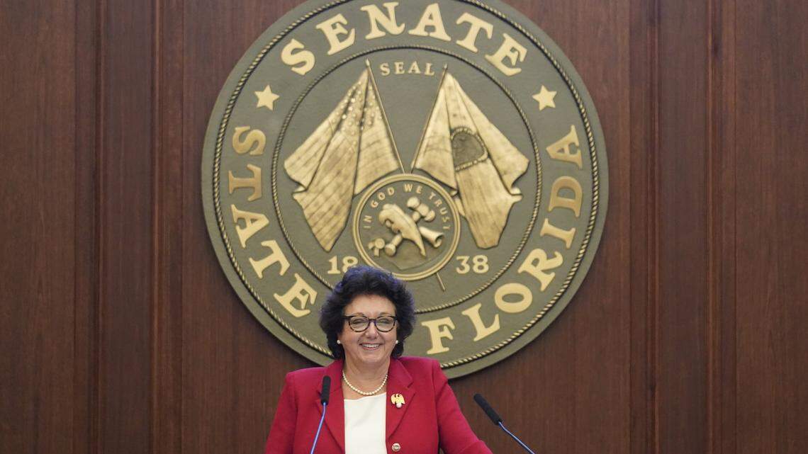 In this March 7, 2022, file photo, Sen. Kathleen Passidomo, who was chosen to be the next president of the state Senate during the 2023 and 2024 terms, smiles as she stands on the dais during a legislative session at the Florida State Capitol in Tallahassee, Florida.