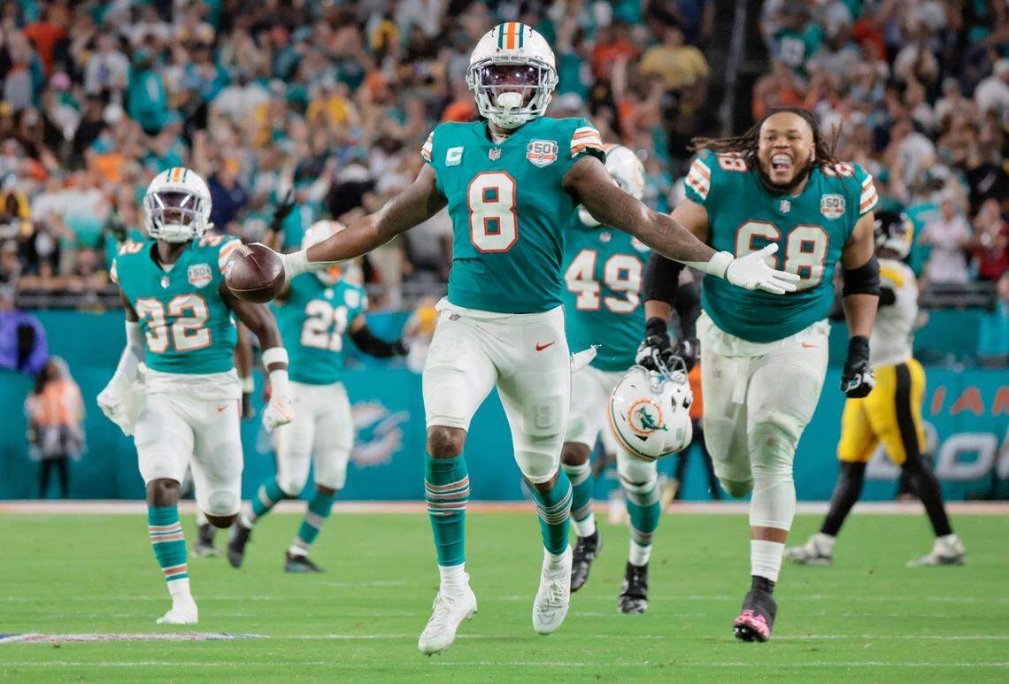 Miami Dolphins safety Jevon Holland (8) reacts after intercepting the ball in the fourth quarter against the Pittsburgh Steelers at Hard Rock Stadium in Miami Gardens on Sunday, October 23, 2022.