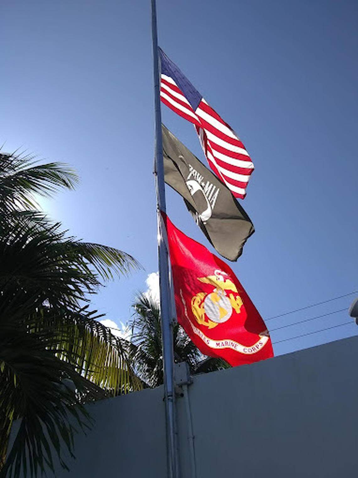 Flags fly in front of the American Legion Gulfstream Post 310 in Hallandale Beach. The small facility for veterans remained open only after the city provided a community grant to rebuild a wheelchair ramp with a slope compliant with the Americans with Disabilities Act.