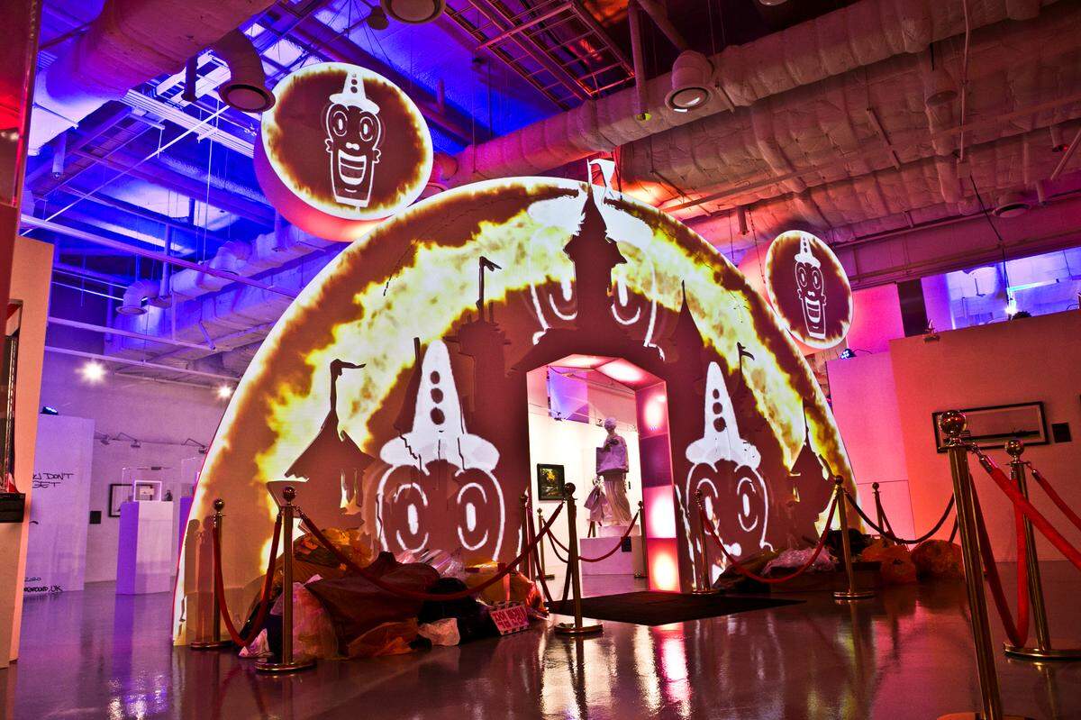 You can walk through one of the installations from Banksy’s “Dismaland” at the new exhibit in Miami.