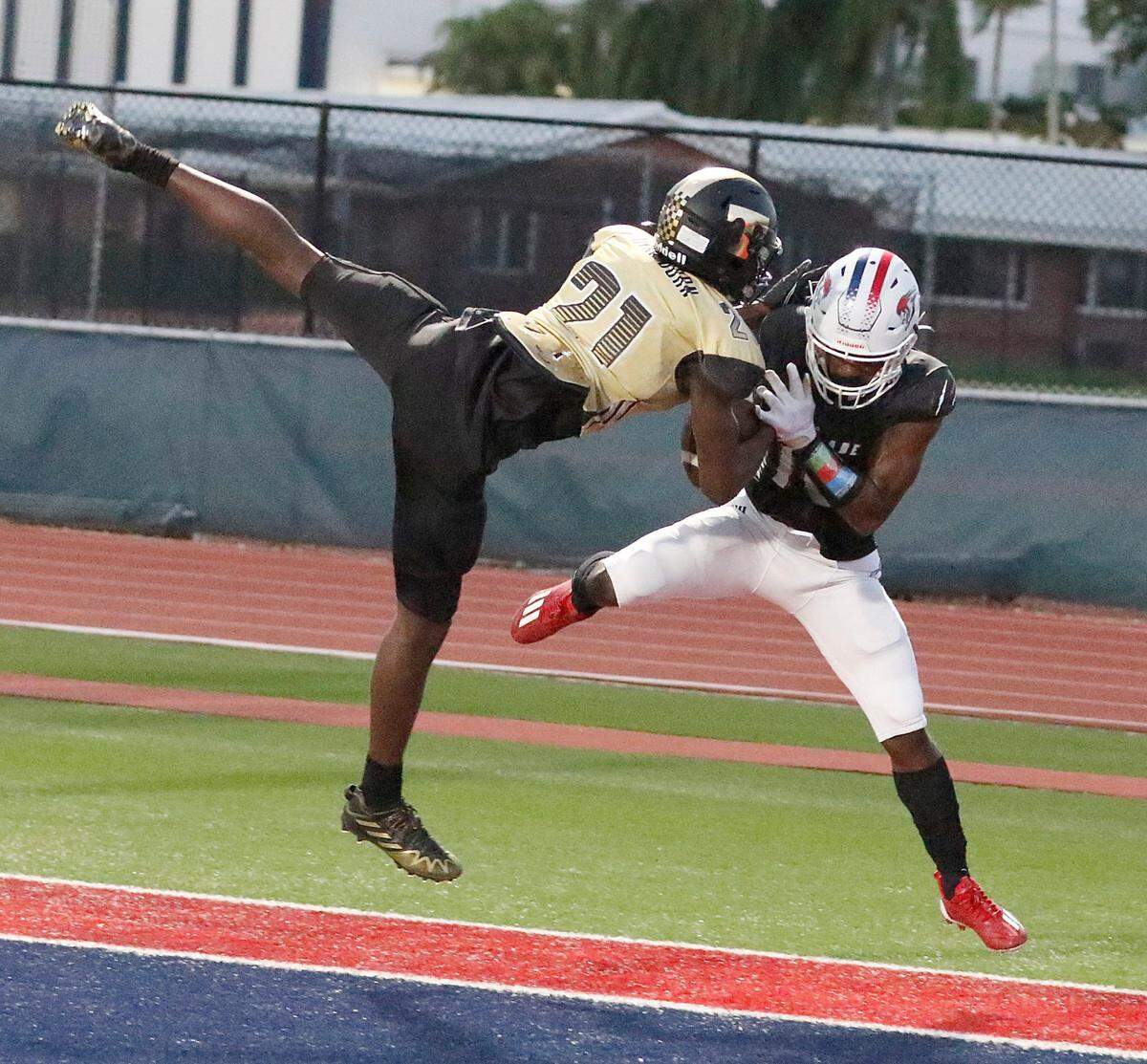 Chaminade-Madonna Lions wide receiver Duane Thomas (10) catches a pass outside end zone during the football game against Treasure Coast Titans on Thursday, November 3, 2022 at Chaminade-Madonna HS in Holliwood. Andrew Uloza / for Miami Herald