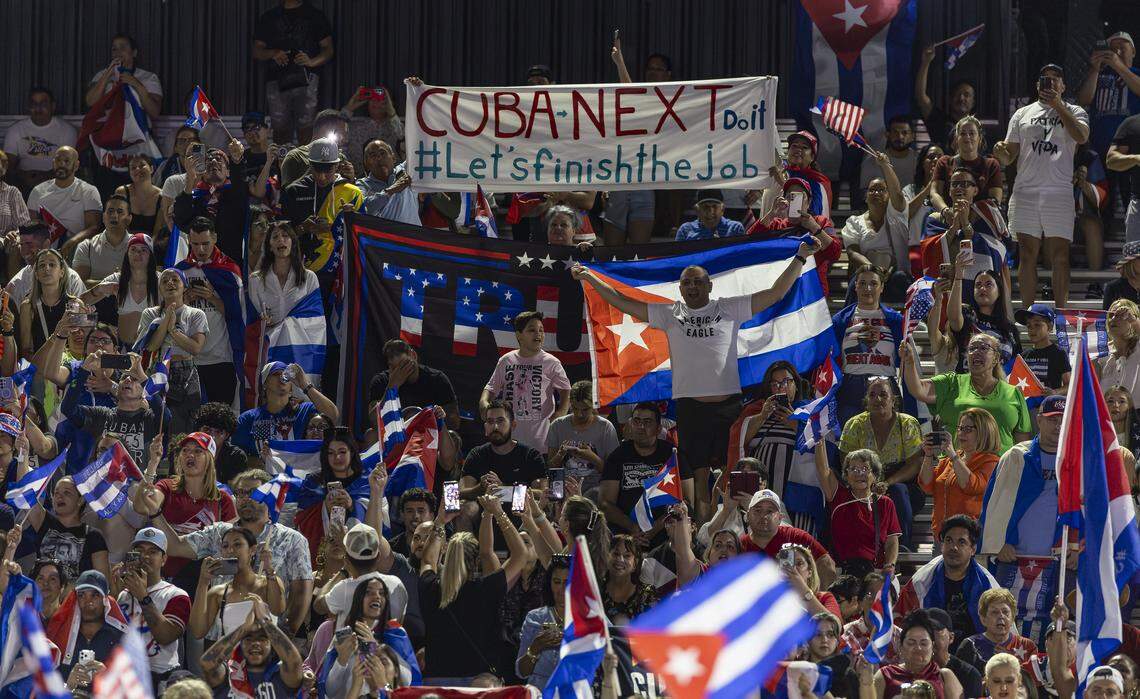 People wave flags as they attend the Free Cuba Rally at Milander Park on Tuesday, March 24, 2026, in Hialeah, Fla. The demonstration, which was organized in part by the City of Hialeah, aims to bring together voices of the Cuban exile community in support of Cuba's freedom.
