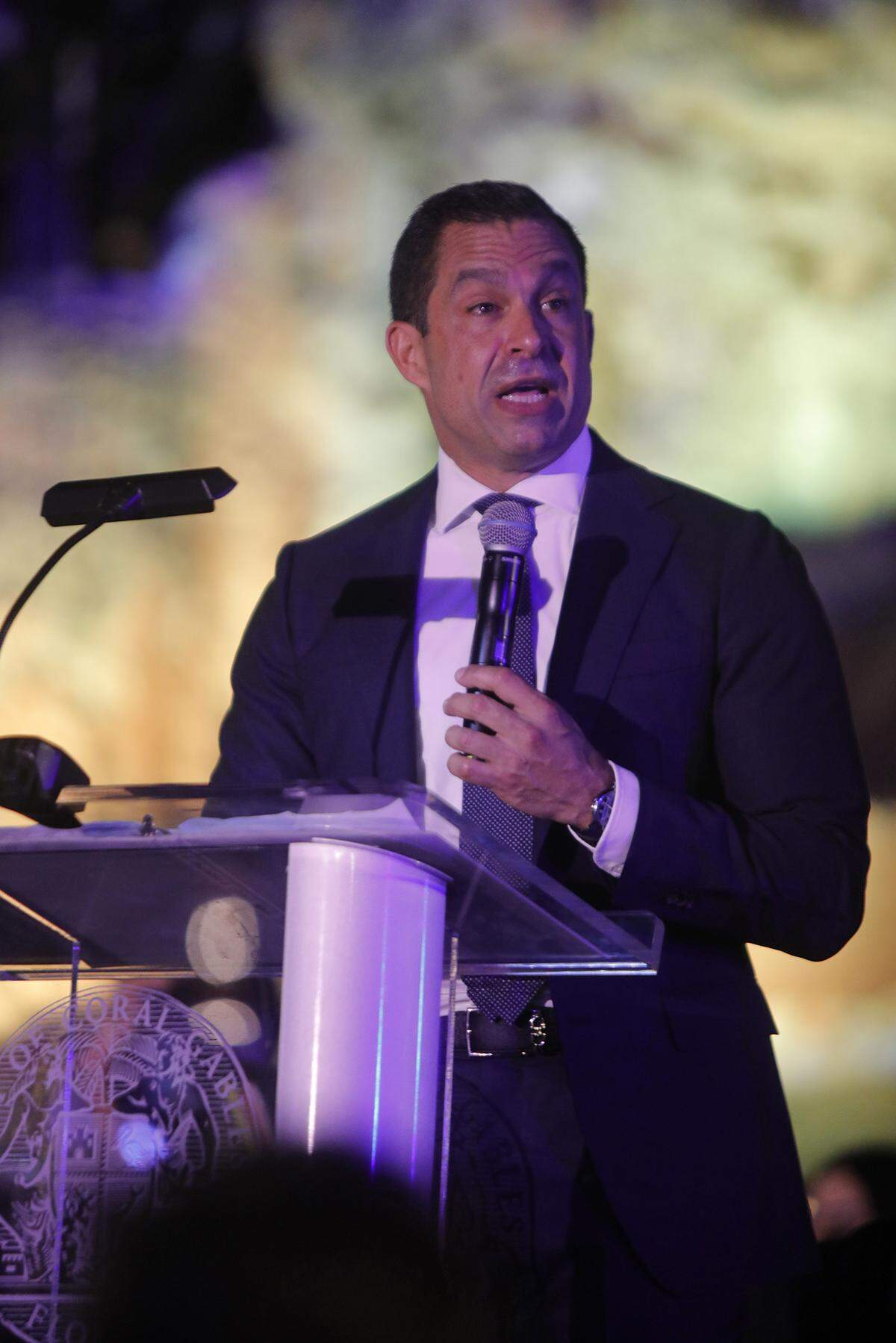 Coral Gables Mayor Vince Lago speaks during the centennial concert at the soon-to-reopen Venetian Pool to celebrate the city’s 100th anniversary on Sunday, Dec. 7, 2025, in Coral Gables, Florida.