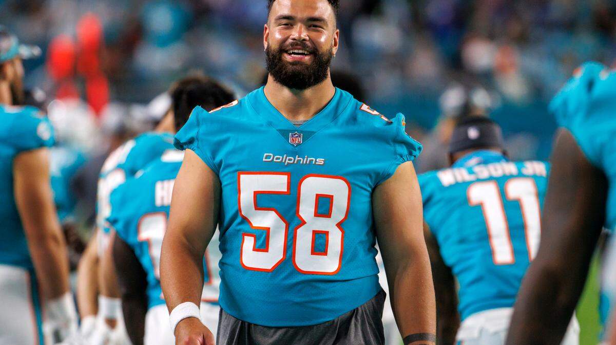Miami Dolphins center Connor Williams (58) looks from the sidelines during third quarter of an NFL preseason football game against the Las Vegas Raiders at Hard Rock Stadium on Saturday, August 20, 2022 in Miami Gardens, Florida.
