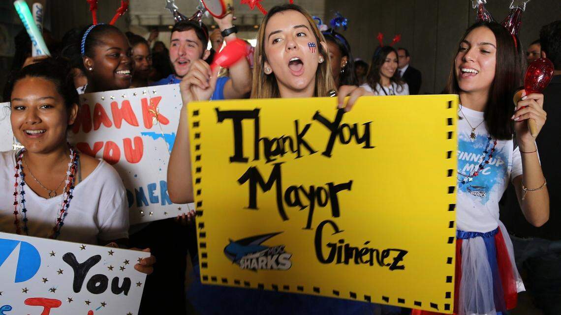 Members of Miami Dade North Campus SGA, Carolina Mendoza, center, and Karina Alegre, 18, right, came out to vote after Miami Dade North was added to the early voting sites.  Students, faculty, and staff joined to thank the college president, Miami-Dade mayor, and the county commissioners on the first day of early voting on Monday, Oct. 22, 2018 at the Miami Dade College North Campus.