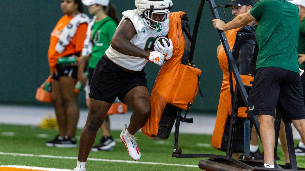 Miami Hurricanes linebacker Elija Lofton (9) runs through drills at the Carol Soffer Indoor Practice Facility on Thursday, August 1, 2024, in Coral Gables, Fla.