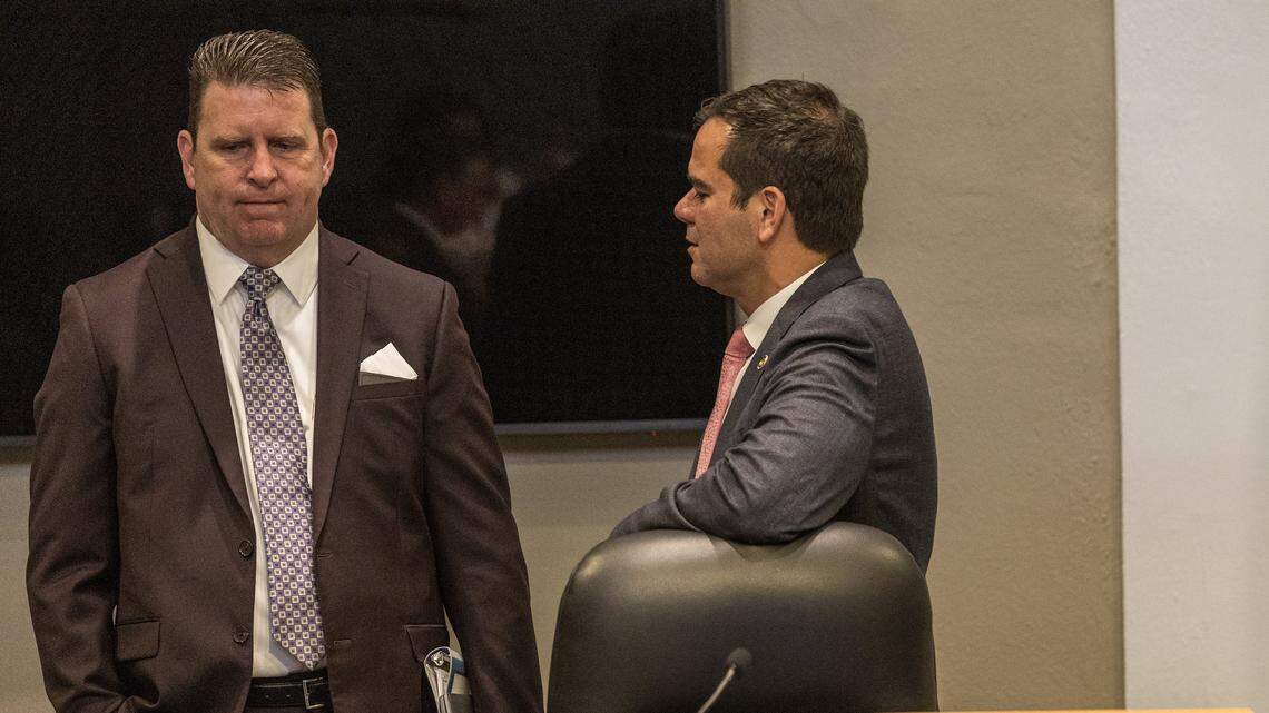City Attorney George K. Wysong III (left) talks to Commissioner Ralph ”Rafael” Rosado (right) after the cancellation of a special meeting to send two referendums to the November ballot due to the lack of quorum, on Friday Sept. 5, 2025.