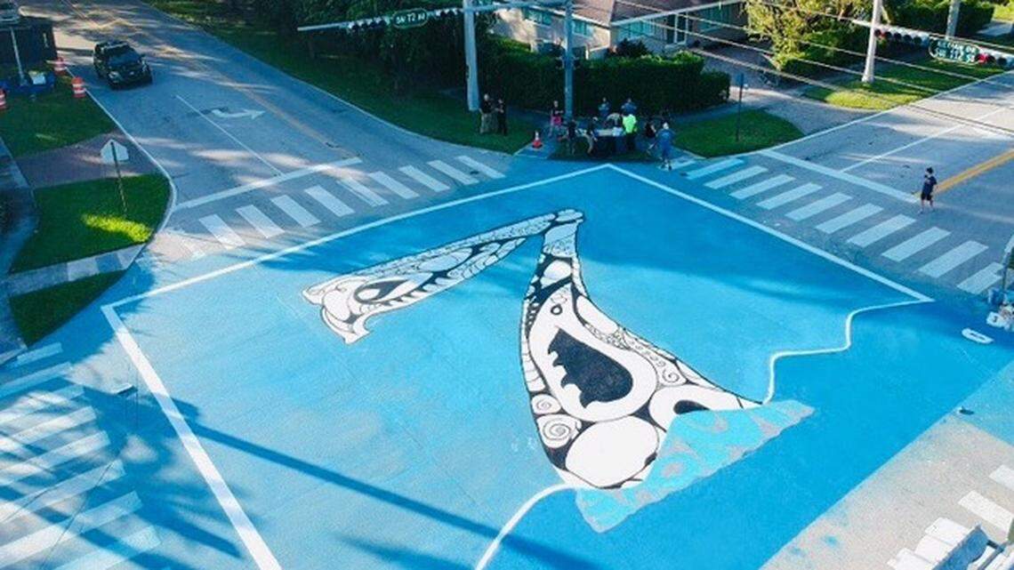 Miami artist Xavier Cortado painted four intersections in Pinecrest with their elevations as a public art project about climate change’s impact on the community. “I’m trying to make sea level rise impossible to ignore,” he said.