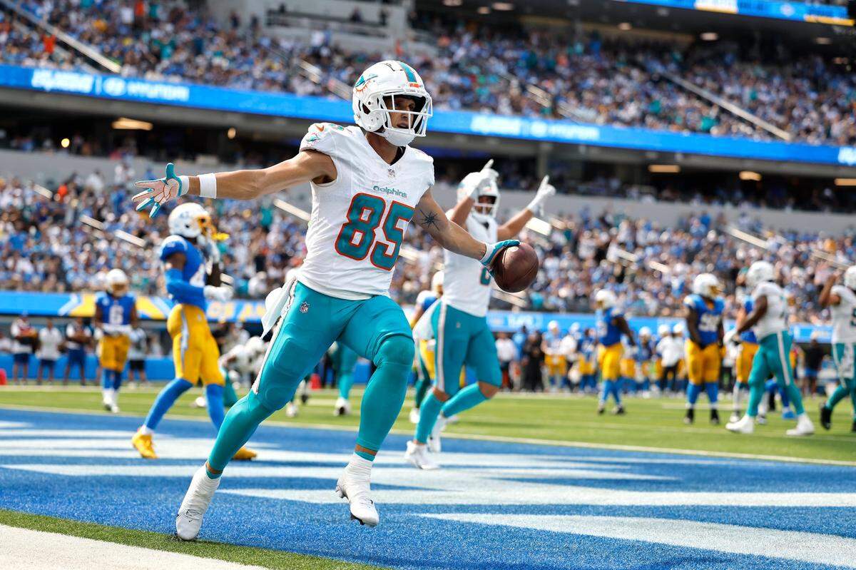 Miami Dolphins wide receiver River Cracraft (85) reacts after scoring a touchdown against Los Angeles Chargers during second half of an NFL football game at SoFi Stadium in Inglewood, California on Sunday, September 10, 2023.