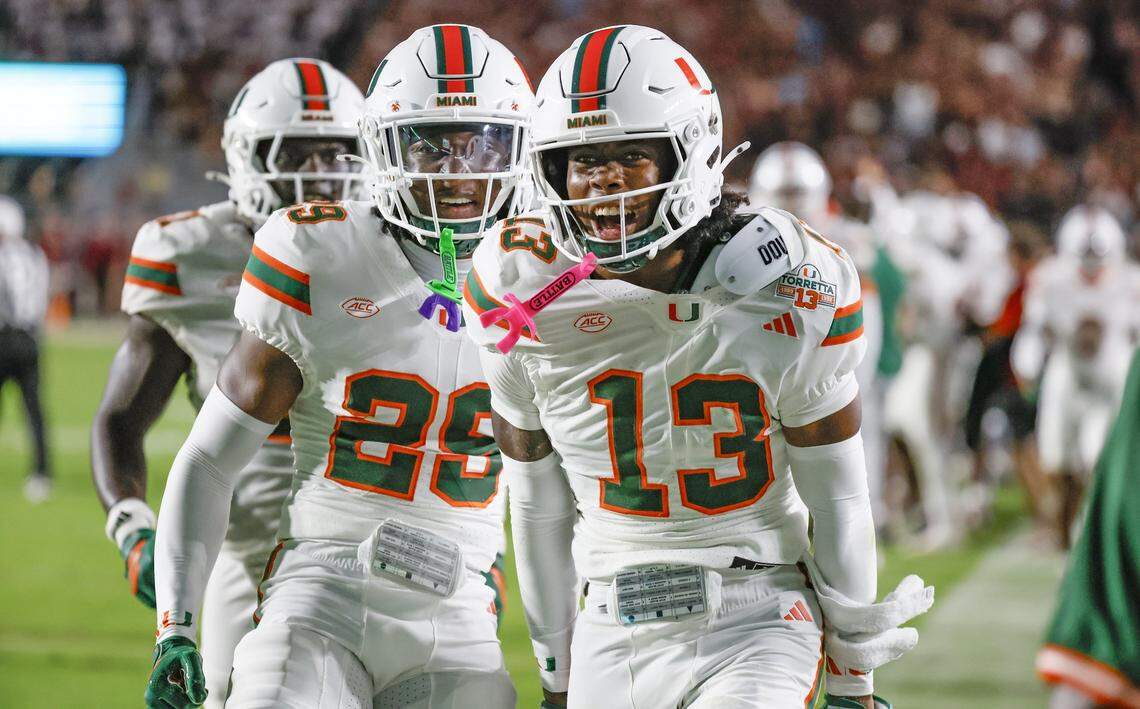 Miami Hurricanes defensive back Bryce Fitzgerald (13) celebrates after scoring in the first half of the NCAA game against the Florida State Seminoles at Doak Campbell Stadium in Tallahassee, Florida, on Saturday, October 4, 2025.