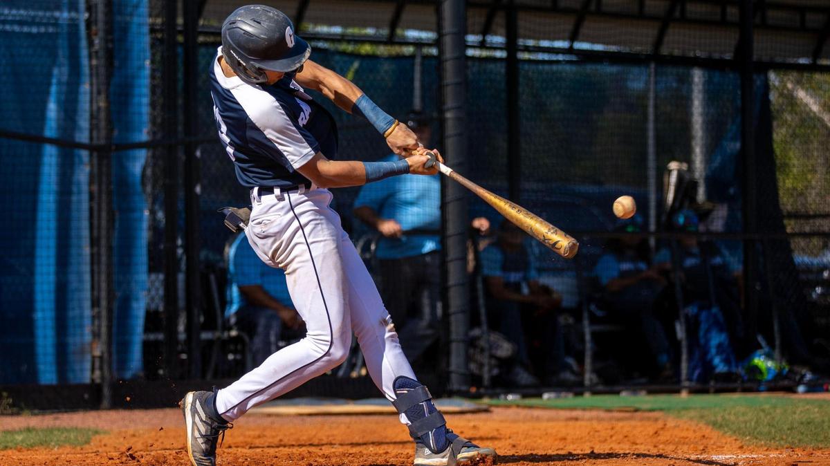 Gulliver Prep junior Jacob Lombard swings at a pitch for a single during a high school baseball game against Somerset Academy Silver Palms at Gulliver Academy, in Coral Gables, Florida, on Tuesday, April 25, 2023.