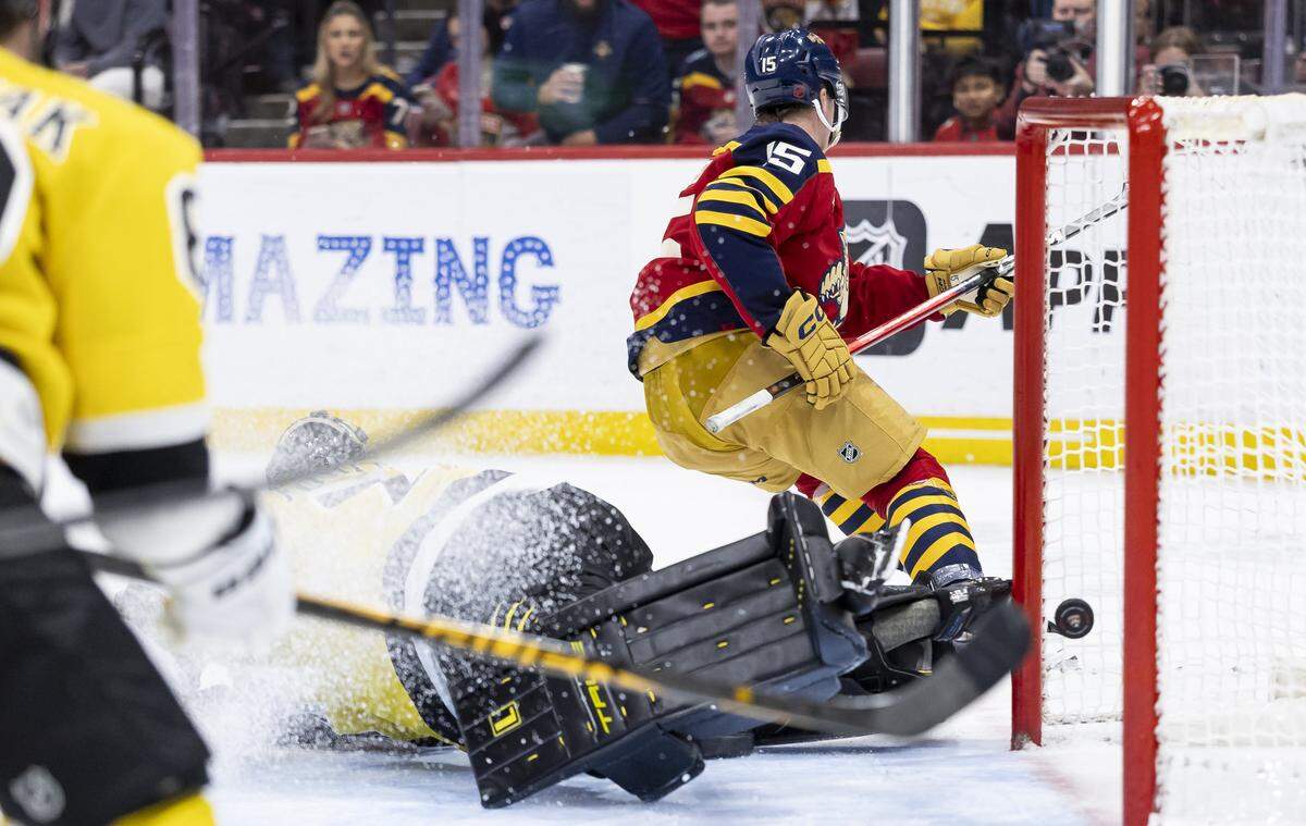 Florida Panthers center Anton Lundell (15) scores a goal against Boston Bruins goaltender Joonas Korpisalo (70) in the second period of their NHL game at the Amerant Bank Arena on Wednesday, Feb. 4, 2026, in Sunrise, Fla.