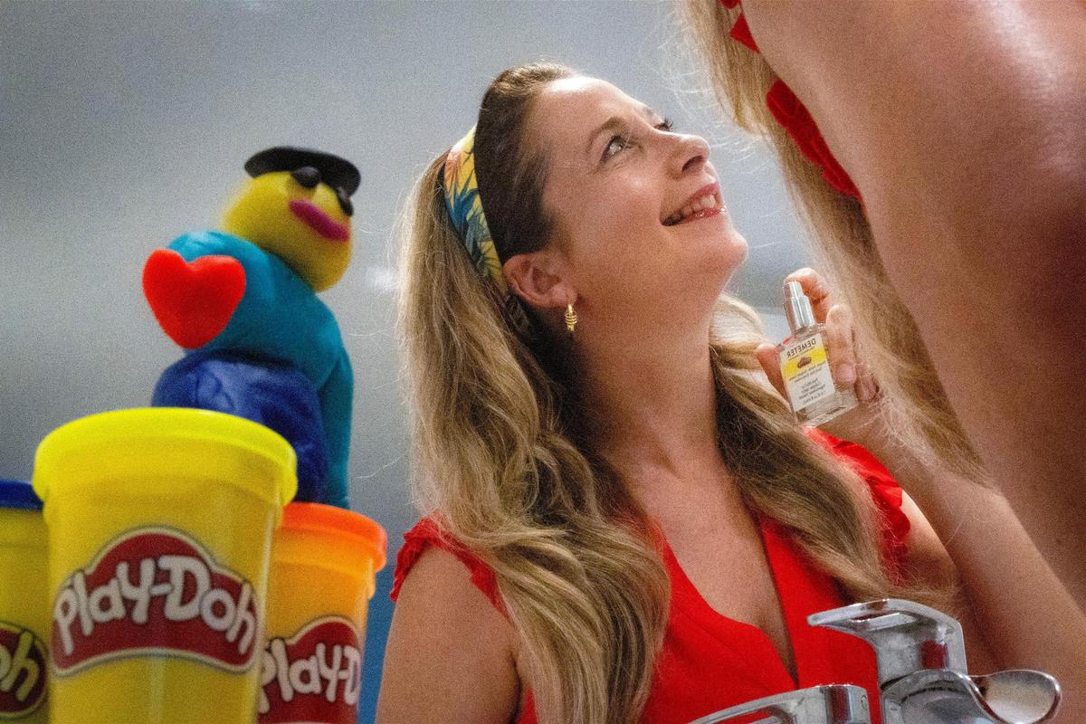 Our model Anna Zilberberg loves the scent of Play-Doh cologne.