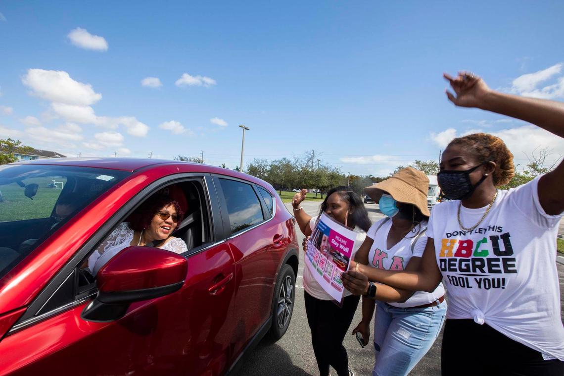 Jacqueline Moody and Crystal Moody are welcome by Volunteers Keyonna Escobar, Theresa Byrd and Vanessa Somellian during “Stay Well Community Vaccine Event” at the Sweet Home Missionary Baptist Church, in Cutler Bay, on Saturday February 26, 2022.