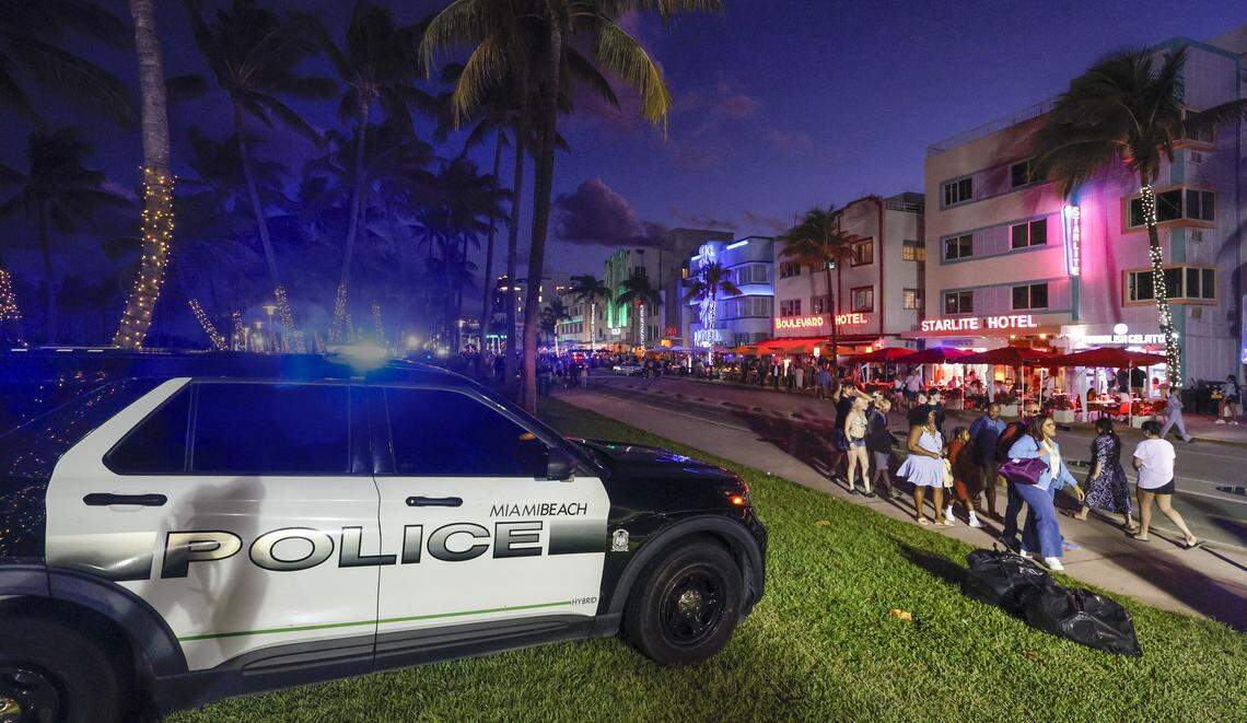 Miami Beach police increased enforcement of a city ordinance banning public camping in mid-2024, heeding the requests of elected officials. The number of camping arrests more than tripled in 2025. Here, a Miami Beach patrol car is parked as officers overlook Ocean Drive in the neighborhood of South Beach on Miami Beach, Florida, on Friday, March 20, 2026. 